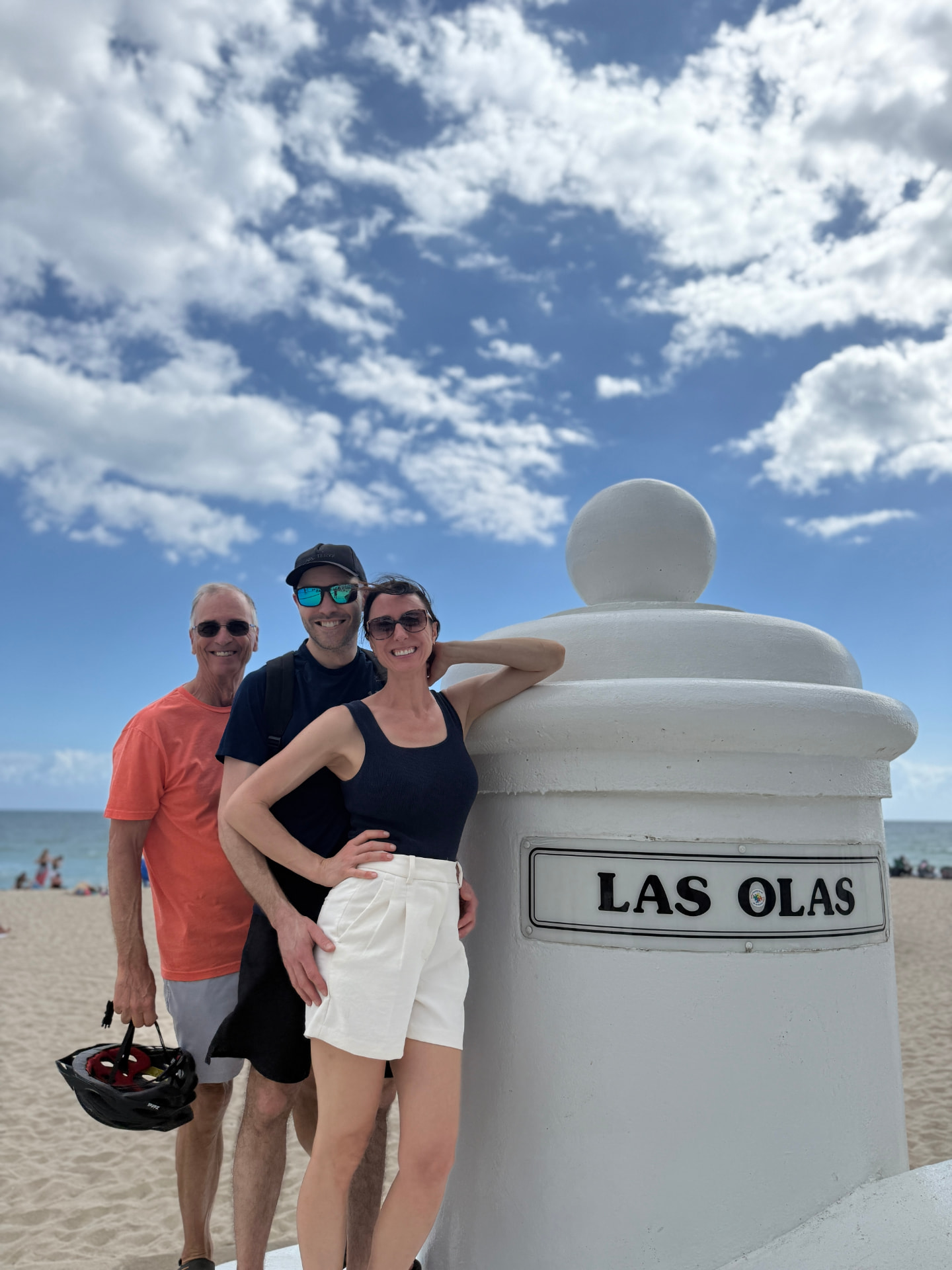 EzeBike riders at the Las Olas beach marker in Fort Lauderdale