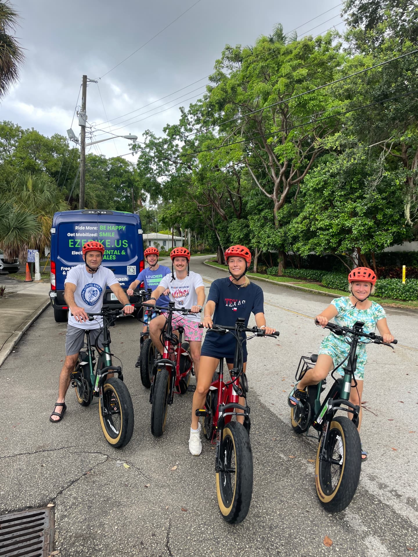Group of five riders with the EzeBike delivery van in Fort Lauderdale