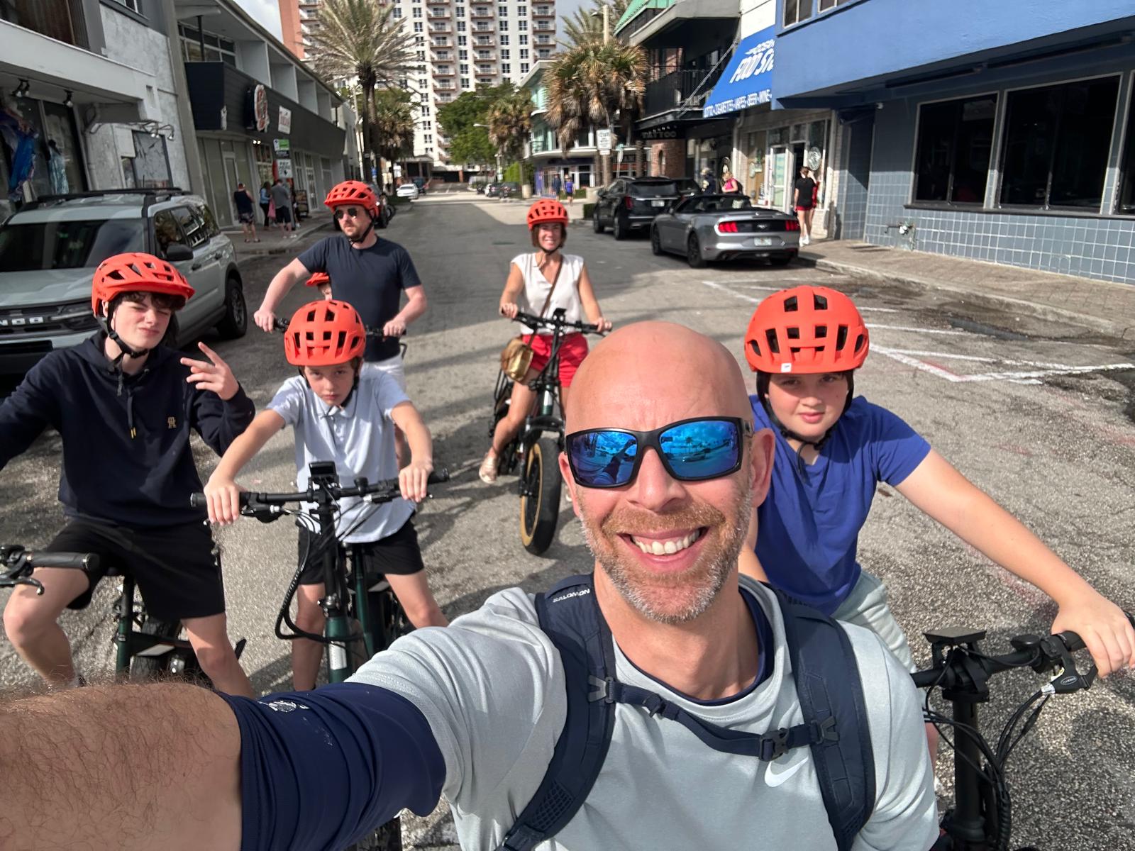 Friends and family group selfie on EzeBike electric bike rentals in Fort Lauderdale