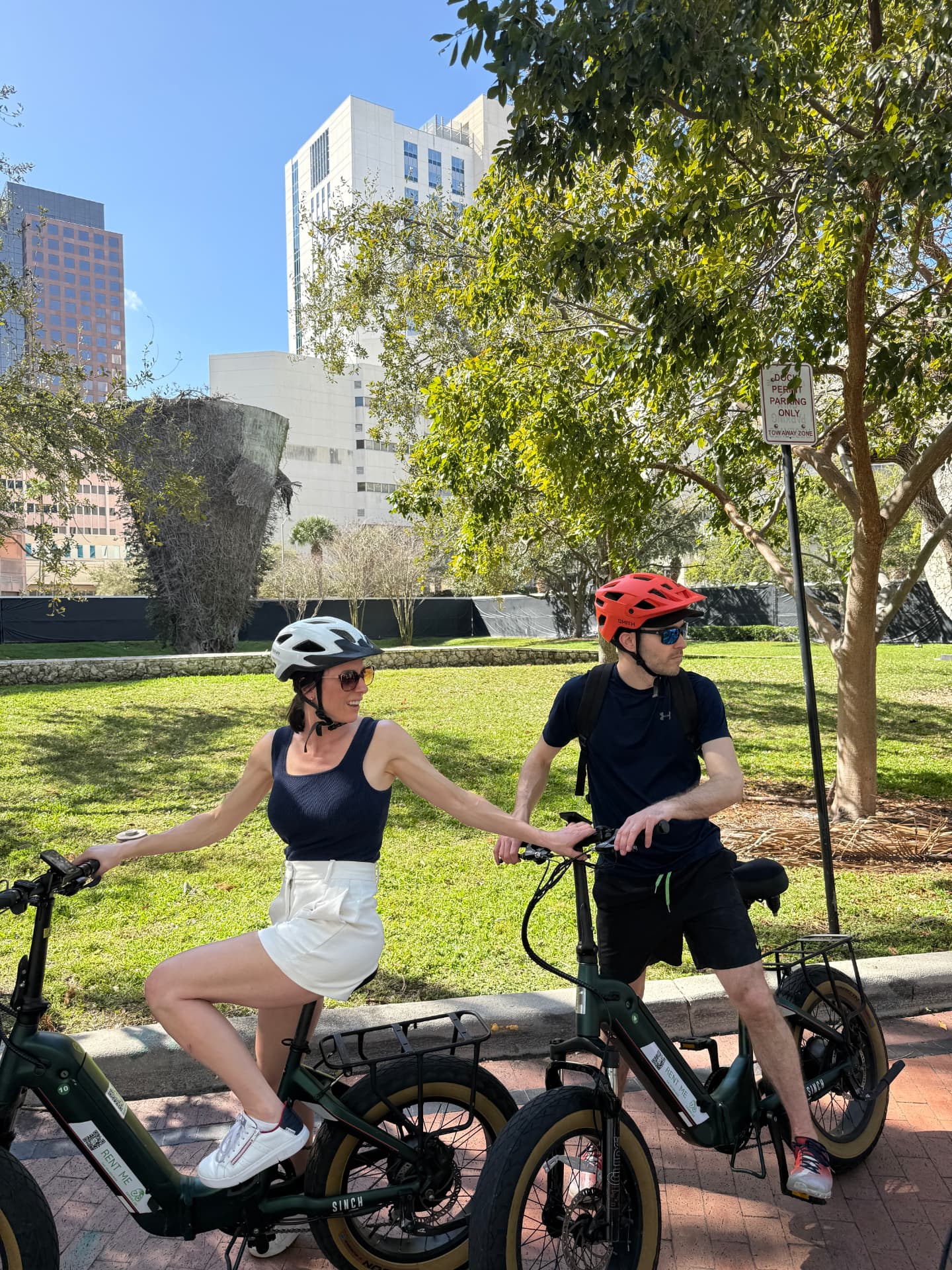 Couple on Aventon Sinch eBike rentals in downtown Fort Lauderdale